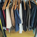 Shirts in linen, stripes and prints on a garment rack