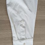 Shirt cuff and placket stitching detail